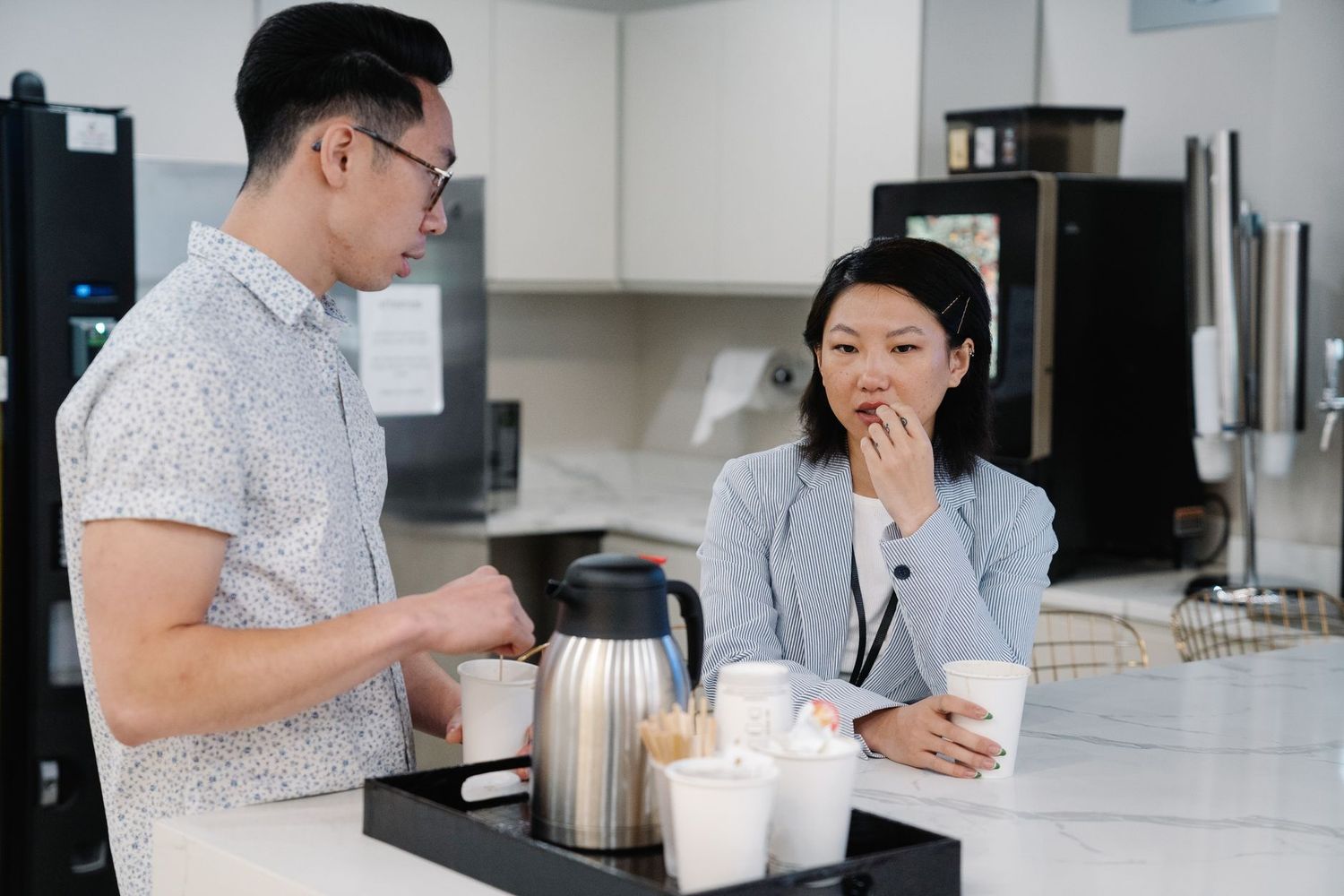 Office coffee bar with employees
